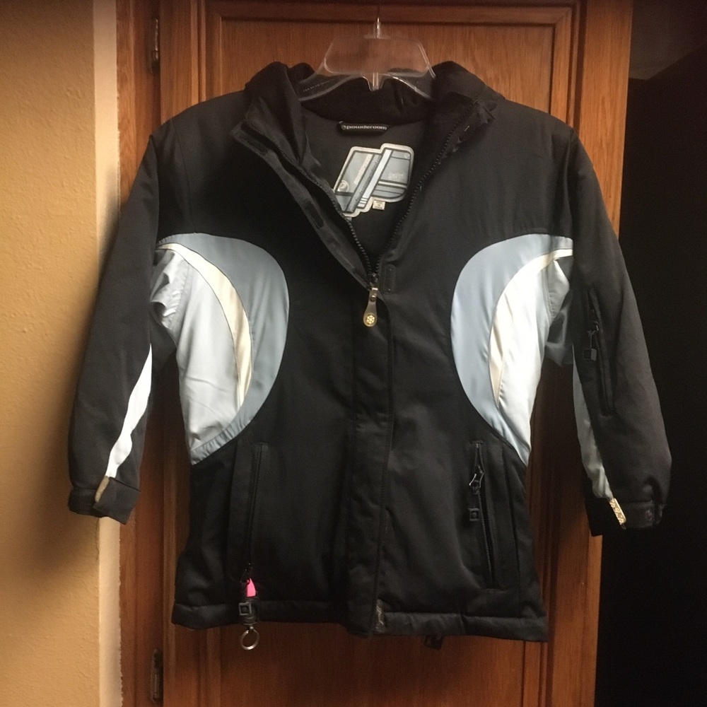 Youth ski jacket by powder room
